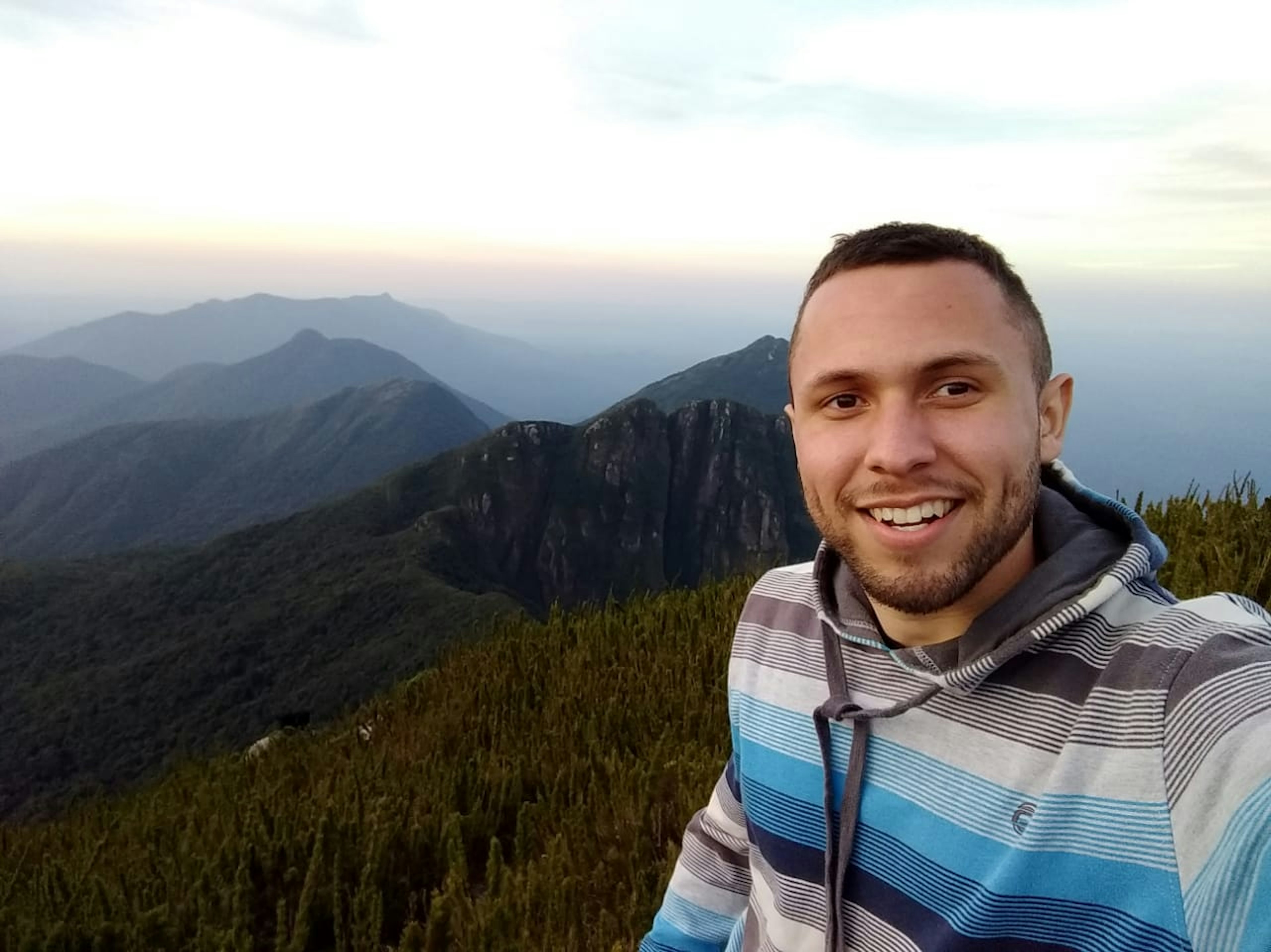 Victor Camargo at the top of Caratuva Hill, on Antonina, Paraná, Brazil.